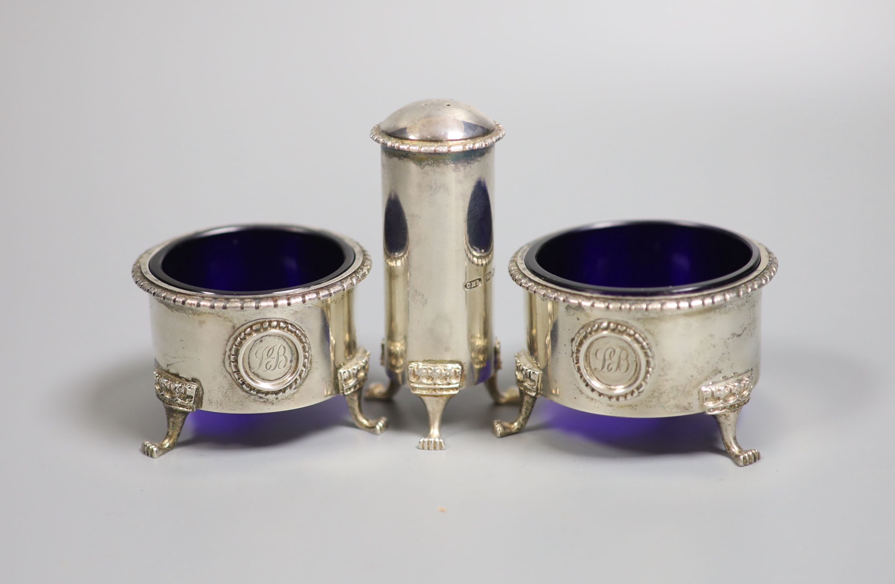 A modern three piece silver condiment set by Christopher Nigel Lawrence, London, 1986, pepper 86mm.